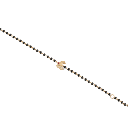 Bunny charm bracelet on white background — 14k gold kids nazariya diamond bracelet with black beads