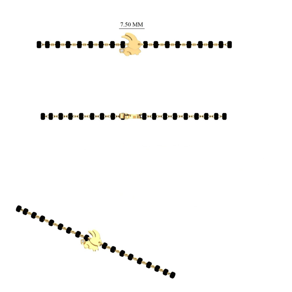 Side view of bunny charm bracelet — 14k gold kids nazariya diamond bracelet with polished finish