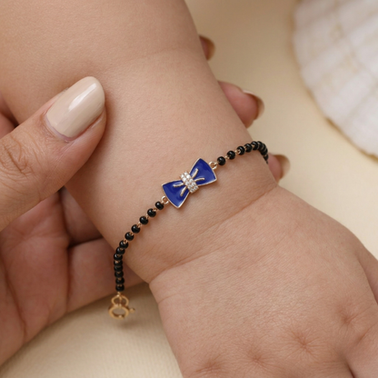 Child wearing blue bow kids nazariya — natural diamond gold bracelet