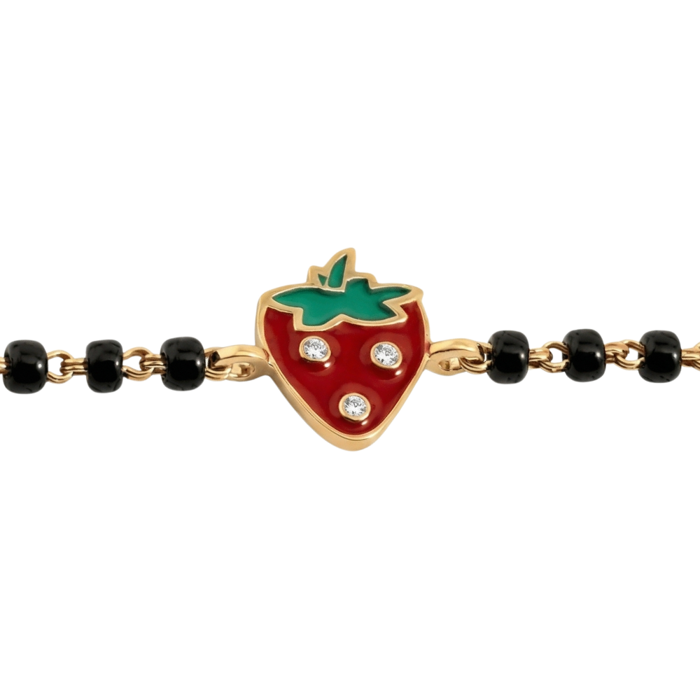 Natural diamond strawberry charm detail — 14k gold kids nazariya with black bead chain