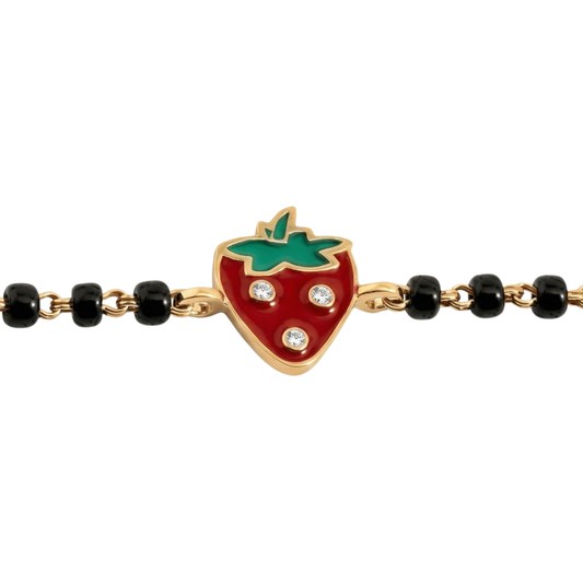 Natural diamond strawberry charm detail — 14k gold kids nazariya with black bead chain