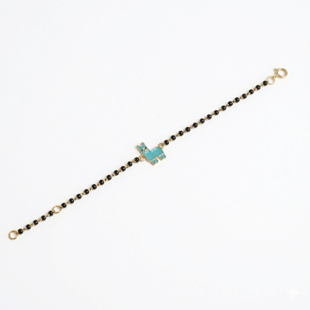 Full bracelet on white background — 14k gold llama kids nazariya with black beads