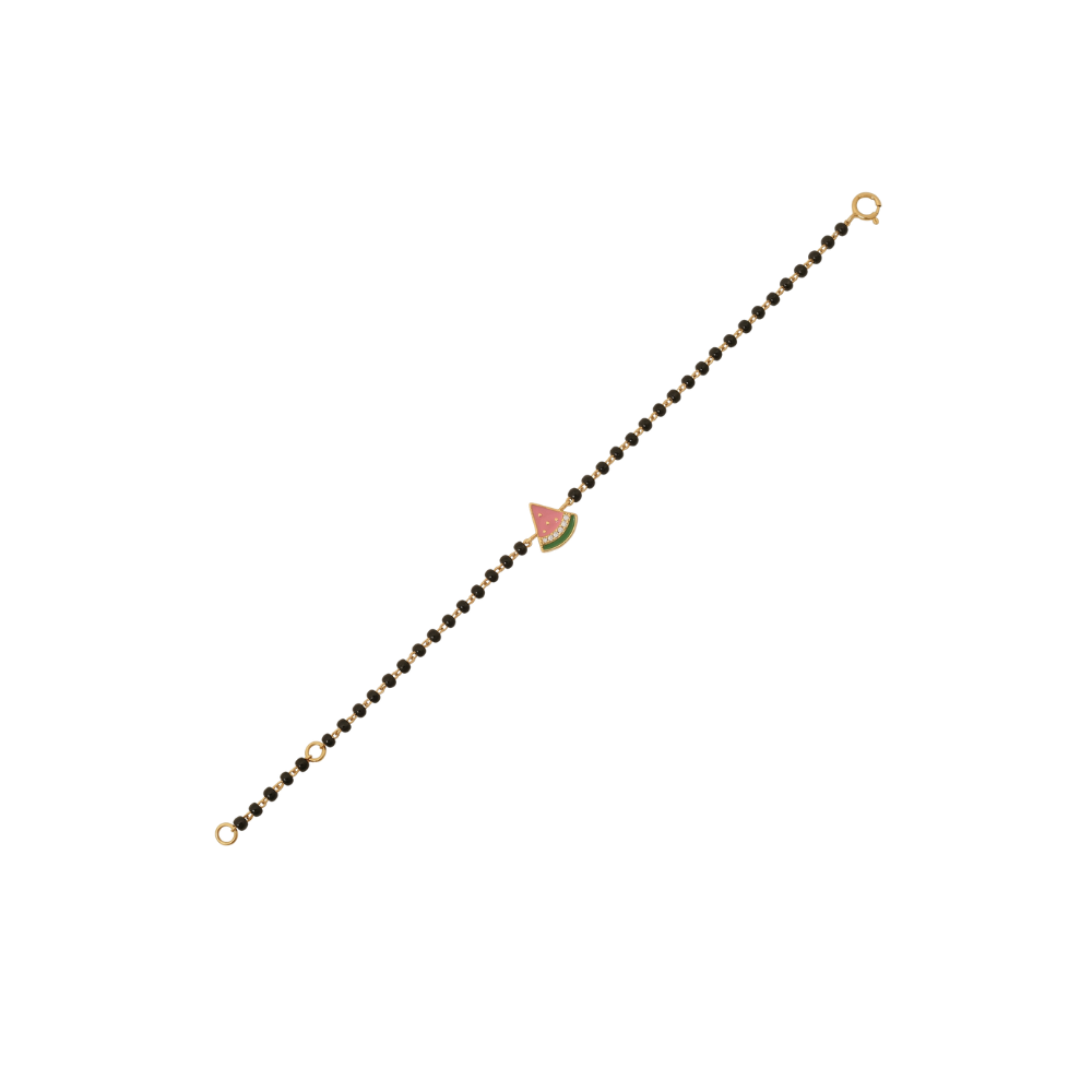 Watermelon charm bracelet on white background — 14k gold kids nazariya diamond bracelet
