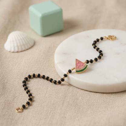 Natural diamond detail on charm — 14k gold watermelon kids nazariya bracelet