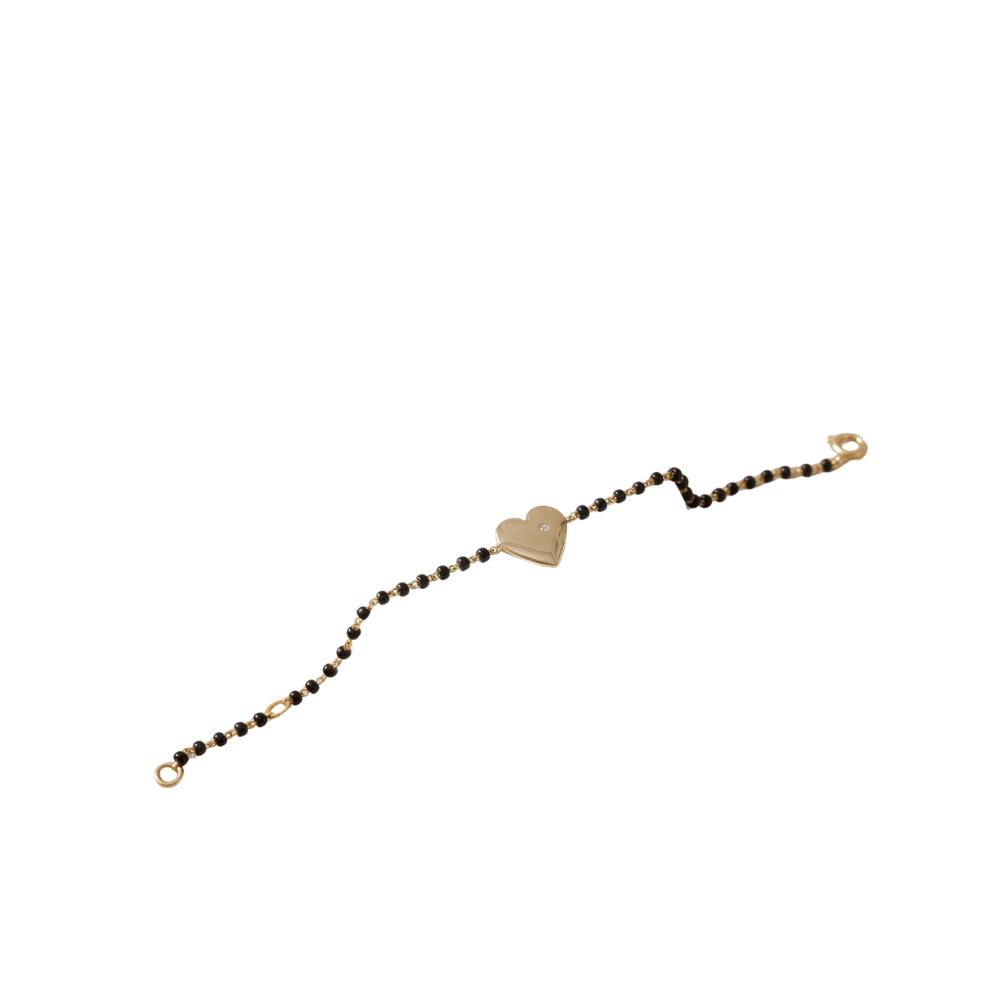 Front view of heart charm nazariya bracelet — 14k gold kids nazariya with natural diamond detail