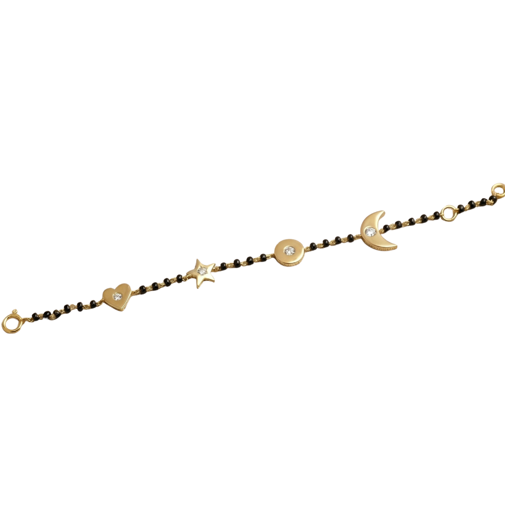 Moon star heart charms detail — 14k gold kids nazariya with protective celestial symbols