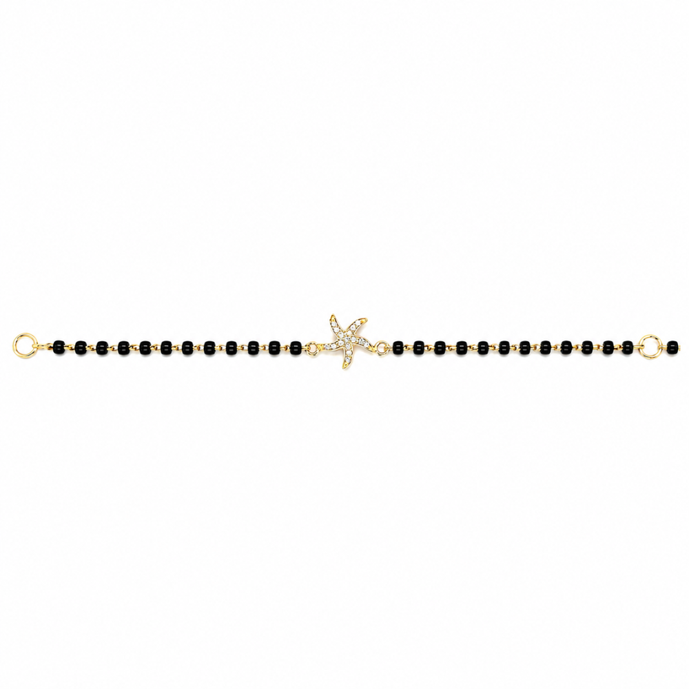 Front view of starfish charm nazariya — 14k gold starfish kids nazariya with black beads