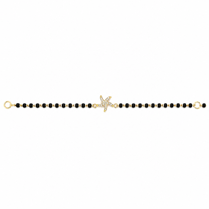 Front view of starfish charm nazariya — 14k gold starfish kids nazariya with black beads