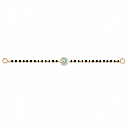 Front view of turquoise evil eye charm — 14k gold kids nazariya diamond halo detail