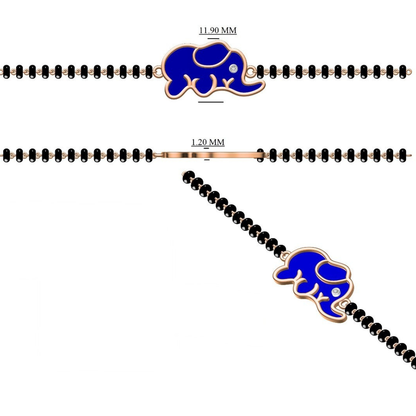 Side angle of blue elephant bracelet — 14k gold kids nazariya with diamond charm and black beads