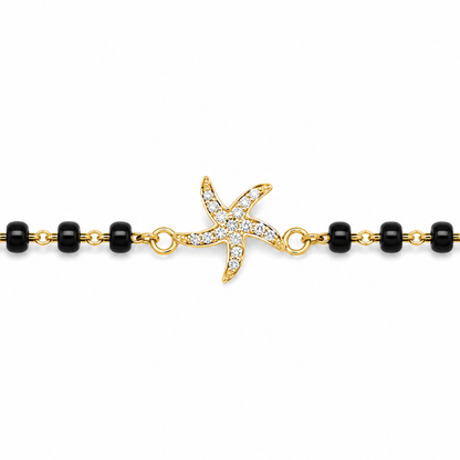 Close-up of diamond set starfish — 14k gold starfish kids nazariya with natural diamonds
