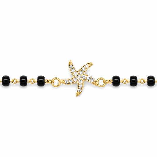 Close-up of diamond set starfish — 14k gold starfish kids nazariya with natural diamonds