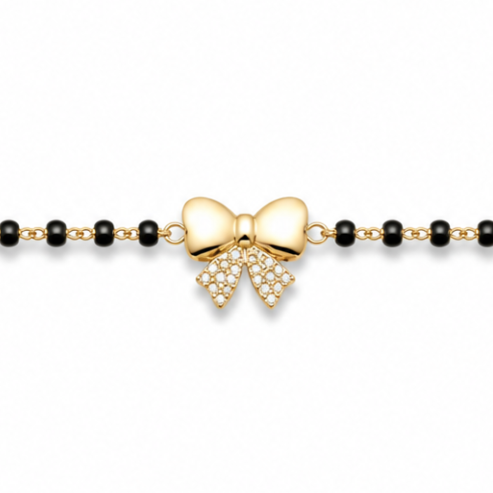 Close-up of pavé diamonds — 14k gold bow kids nazariya with natural diamond bow tails