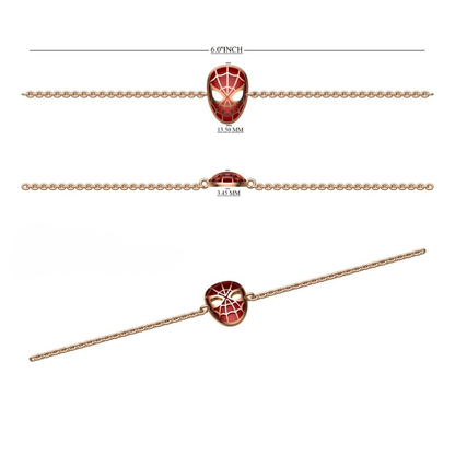 side view of 14k gold kids nazariya bracelet with red enamel web mask charm