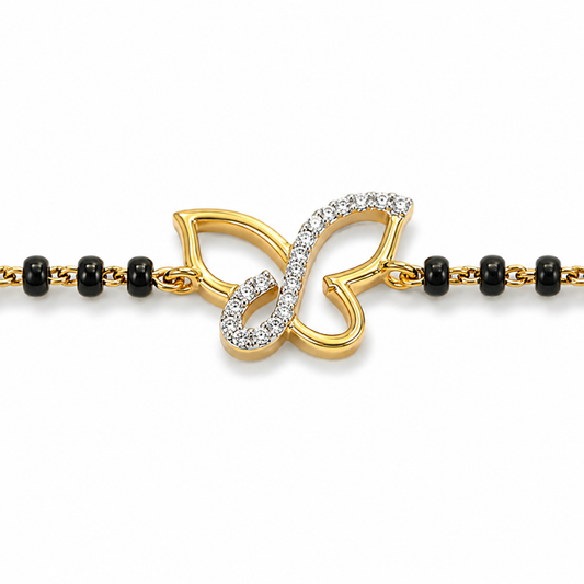 Butterfly charm detail on black beads — 14k gold kids nazariya diamond bracelet protective symbol