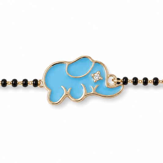 Close-up of diamond accents — 14k gold elephant kids nazariya bracelet with natural diamonds