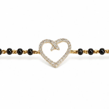 Heart charm detail — 14k gold kids nazariya love and protection symbol