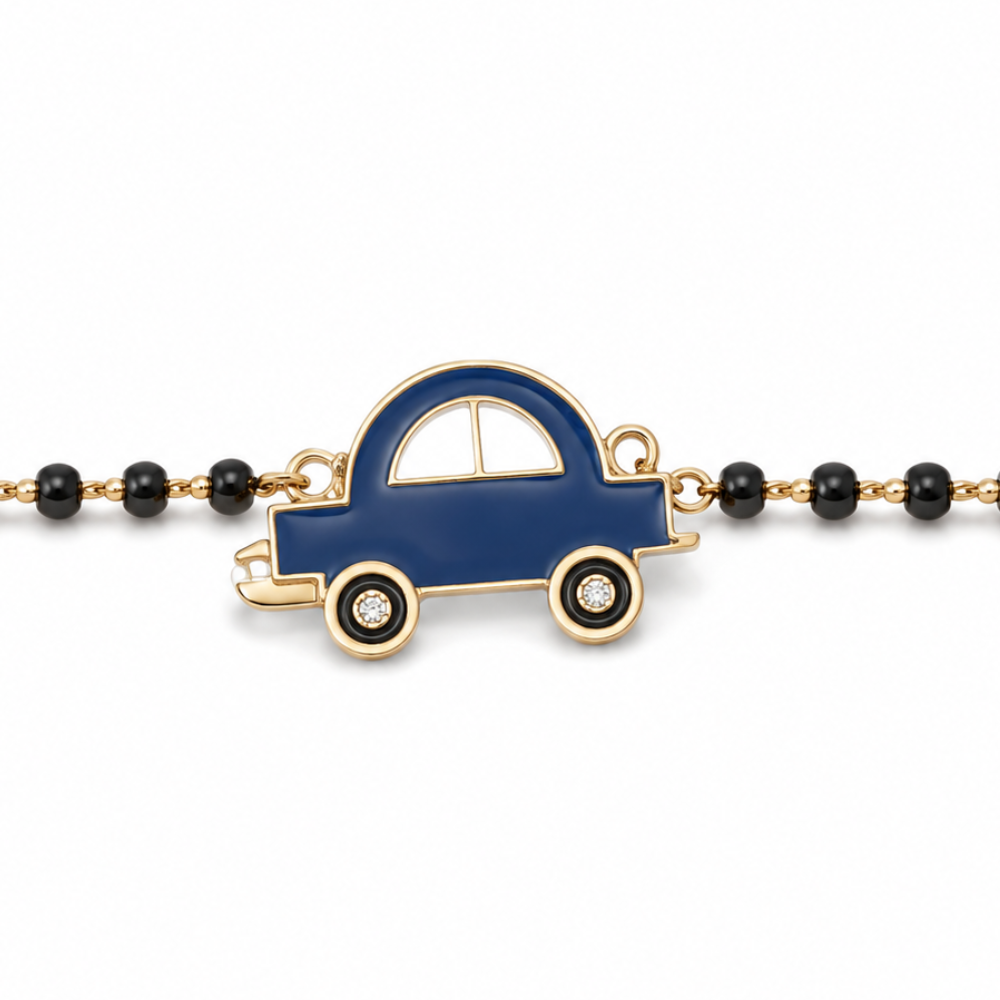 Close-up of diamond wheels — 14k gold car kids nazariya with natural diamond detail